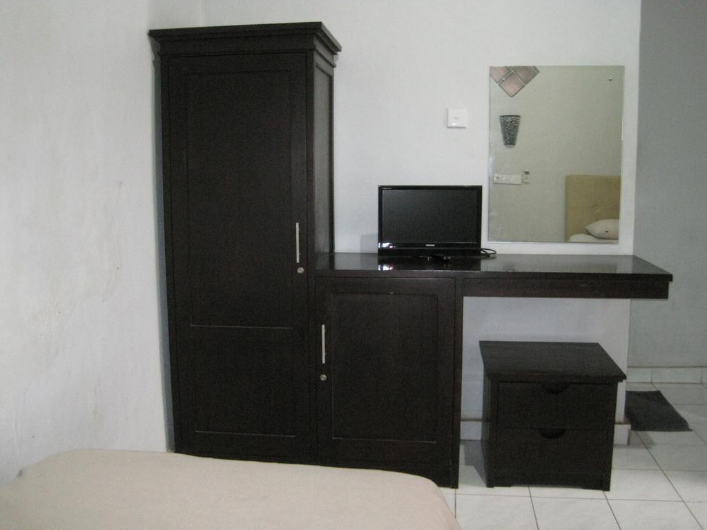 Taman Mekar Beach Inn Кута Экстерьер фото