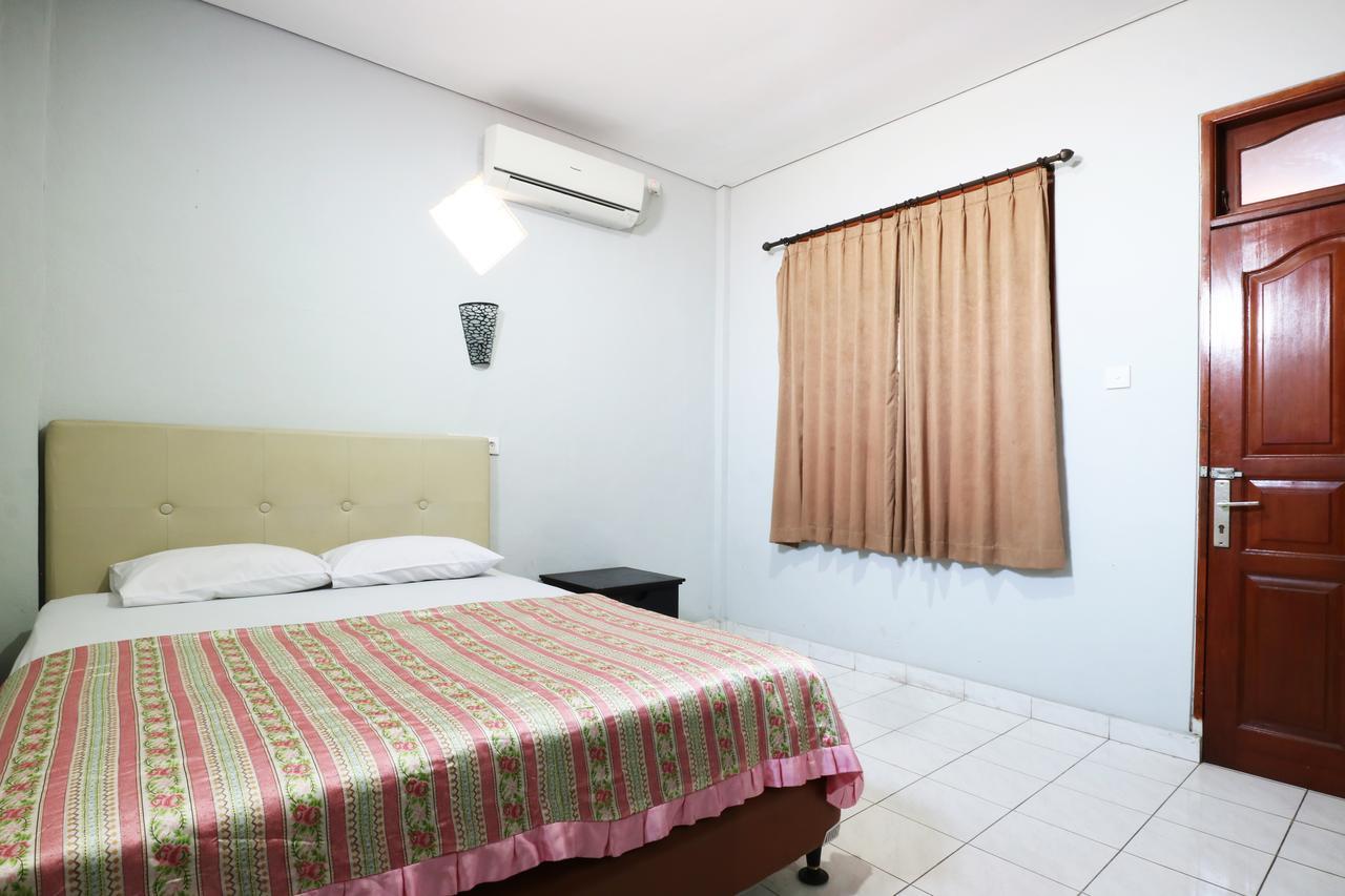 Taman Mekar Beach Inn Кута Экстерьер фото